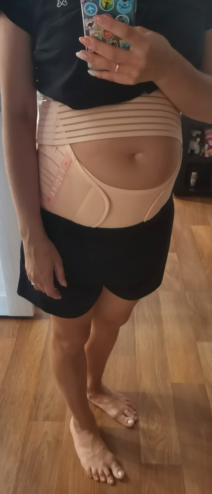 Начились боли в области лобка - симвизит, поэтому пришлось заказать бандаж. Но плюс ещё в том, что его можно использовать и в послеродовый период, не нужен будет покупать другой! Пришёл быстро, упакован в зип-пакет, есть инструкция и подарочки) жвачки Love is и памятка, что взять в роддом(пригодится и кто первый раз едет в роддом и для таких, как я освежить память))Спасибо! Про эффективность пока сказать не могу, но походив около часа, могу сказать, что, однозначно, живот поддерживает, на ощупь мягкий, комфортный! Спасибо!!!