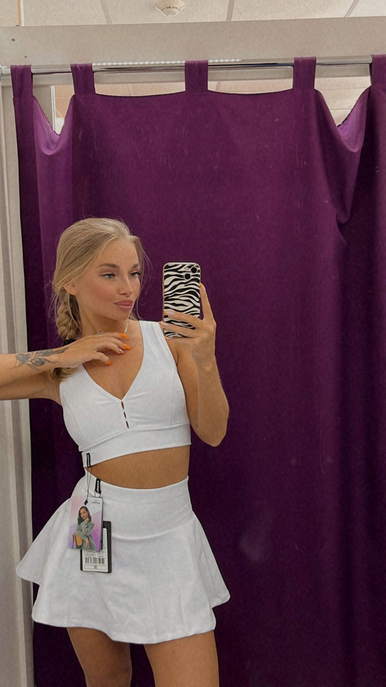 Брала костюмом вместе с топом с этого же магазина, плотный материал, ничего не просвечивает, но юбку взяла бы на размер побольше, ибо шортики под юбкой впиваются туда куда не надо, скорее самый маленький размер на супер худенькую девушку 🙂